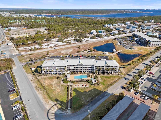 drone / aerial view with a water view