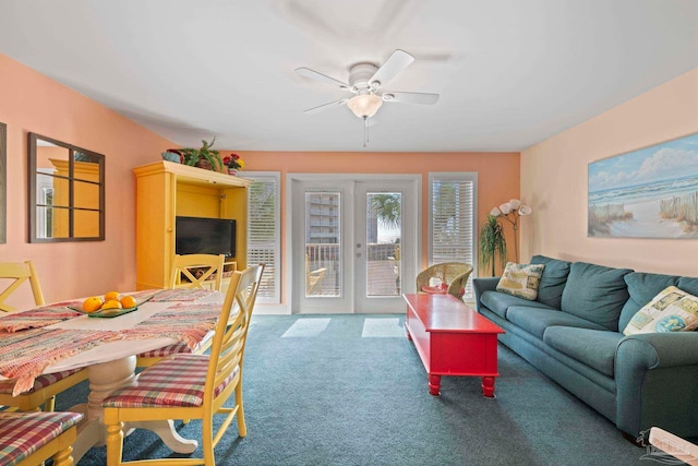 carpeted living room featuring ceiling fan