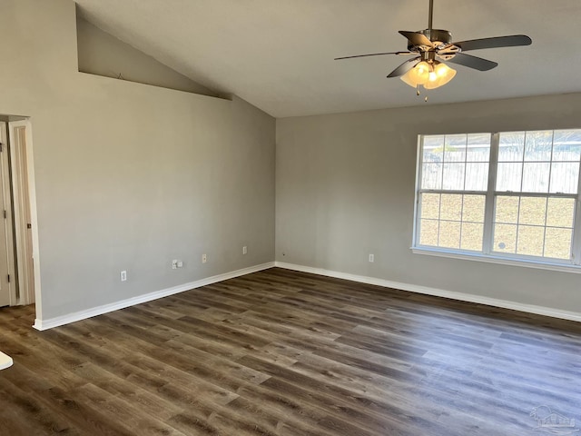 unfurnished room with lofted ceiling, dark hardwood / wood-style floors, and ceiling fan