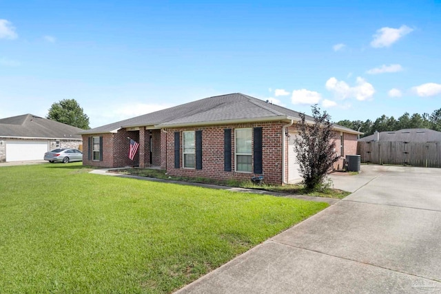 3972 Flour Mill Cir, Pace, FL 32571 - single story home with brick siding, concrete driveway, central air condition unit, and a shingled roof