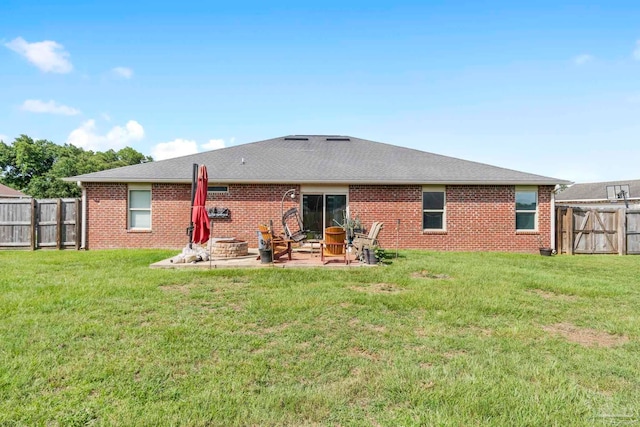 3972 Flour Mill Cir, Pace, FL 32571 - back of house with a patio, brick siding, and roof with shingles