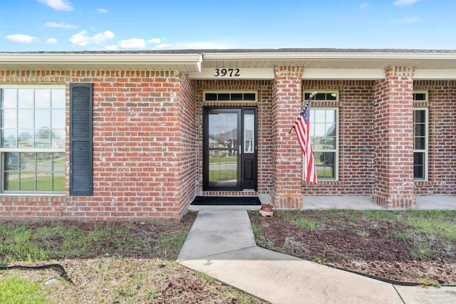 3972 Flour Mill Cir, Pace, FL 32571 - doorway to property with brick siding