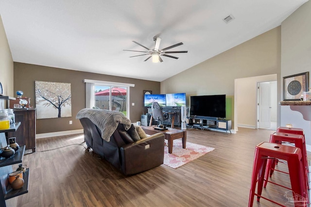 3972 Flour Mill Cir, Pace, FL 32571 - living room with ceiling fan, wood finished floors, baseboards, and high vaulted ceiling
