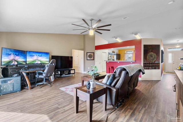 3972 Flour Mill Cir, Pace, FL 32571 - living room featuring lofted ceiling, ceiling fan, wood finished floors, and healthy amount of natural light