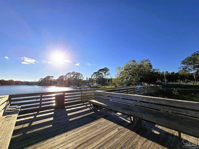 dock area featuring a water view