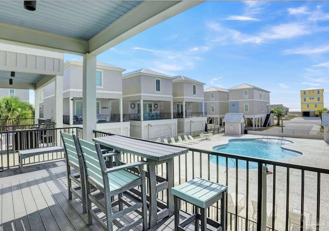 1592 W Beach Blvd Unit Kk, Gulf Shores, AL 36542 - community pool with a residential view and a patio area