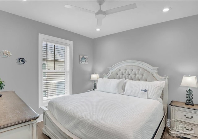 1592 W Beach Blvd Unit Kk, Gulf Shores, AL 36542 - bedroom featuring wood finished floors, a ceiling fan, and recessed lighting