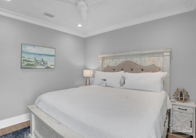 1592 W Beach Blvd Unit Kk, Gulf Shores, AL 36542 - bedroom with ornamental molding, wood finished floors, recessed lighting, baseboards, and ceiling fan