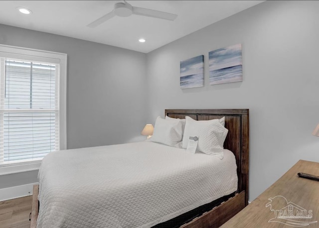 1592 W Beach Blvd Unit Kk, Gulf Shores, AL 36542 - bedroom with wood finished floors, recessed lighting, and ceiling fan