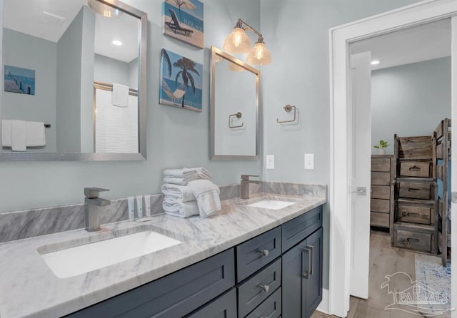 1592 W Beach Blvd Unit Kk, Gulf Shores, AL 36542 - full bath with double vanity and wood finished floors