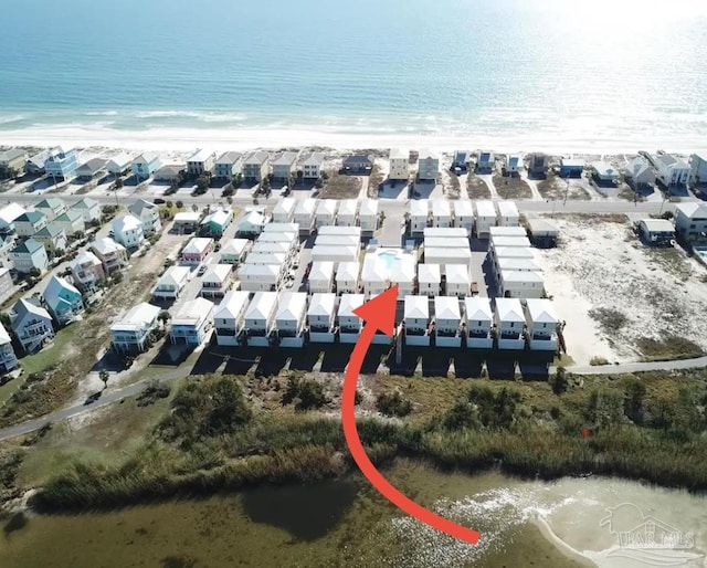 1592 W Beach Blvd Unit Kk, Gulf Shores, AL 36542 - aerial view of property and surrounding area with unending shoreline and nearby suburban area