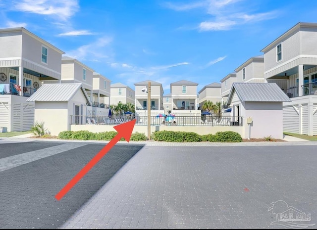 1592 W Beach Blvd Unit Kk, Gulf Shores, AL 36542 - view of asphalt street featuring a residential view