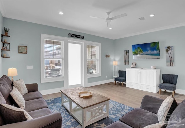 1592 W Beach Blvd Unit Kk, Gulf Shores, AL 36542 - living area featuring healthy amount of natural light, a ceiling fan, wood finished floors, recessed lighting, and baseboards