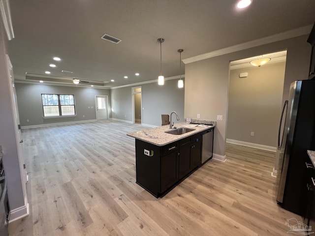 6607 Rocky Shores Rd, Milton, FL 32583 - kitchen featuring stainless steel appliances, ornamental molding, light wood finished floors, recessed lighting, and dark cabinets