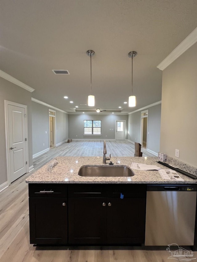6607 Rocky Shores Rd, Milton, FL 32583 - kitchen with dishwasher, dark cabinetry, open floor plan, crown molding, and light wood finished floors