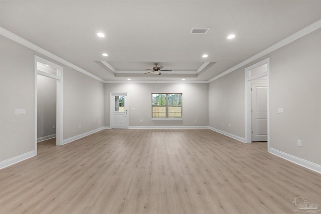 6607 Rocky Shores Rd, Milton, FL 32583 - unfurnished living room featuring crown molding, a raised ceiling, light wood-style floors, recessed lighting, and a ceiling fan