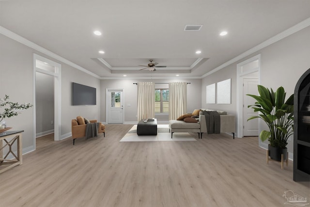 6607 Rocky Shores Rd, Milton, FL 32583 - living area with light wood finished floors, recessed lighting, crown molding, ceiling fan, and a raised ceiling