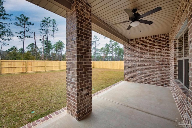 view of patio featuring ceiling fan