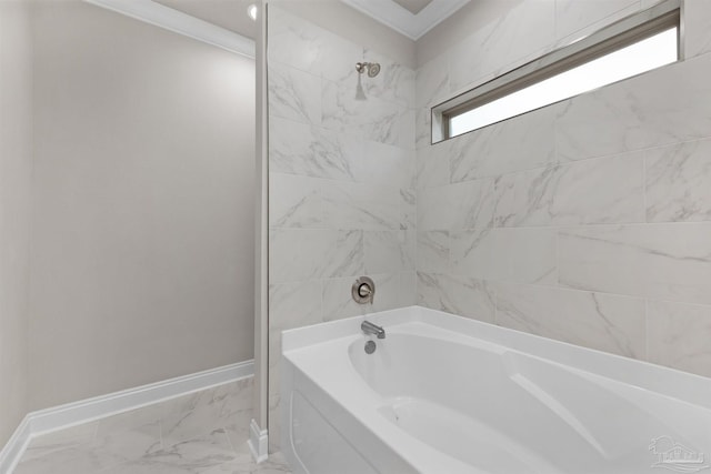 bathroom with a tub to relax in and crown molding