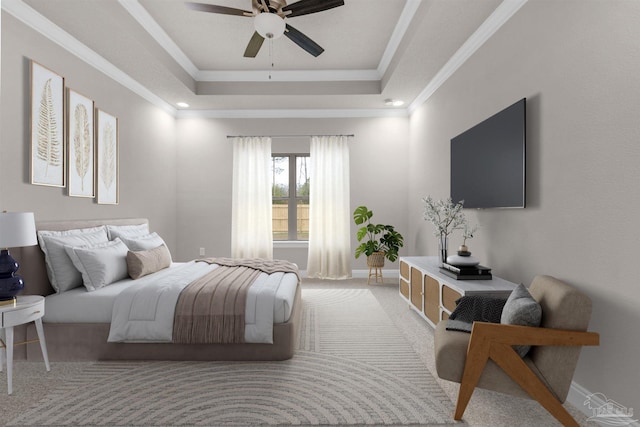 carpeted bedroom with a raised ceiling, ceiling fan, and crown molding