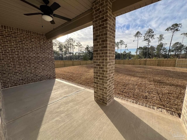 6607 Rocky Shores Rd, Milton, FL 32583 - fenced backyard with ceiling fan and a patio