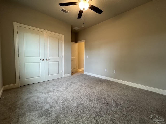 6607 Rocky Shores Rd, Milton, FL 32583 - unfurnished bedroom with carpet flooring, a closet, and ceiling fan