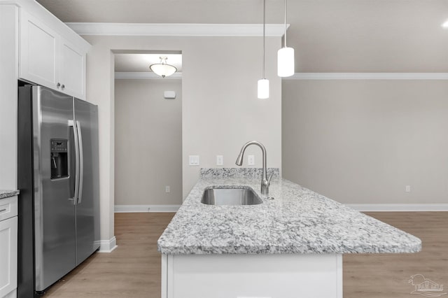6607 Rocky Shores Rd, Milton, FL 32583 - kitchen with stainless steel fridge with ice dispenser, crown molding, a peninsula, light wood-style floors, and white cabinets
