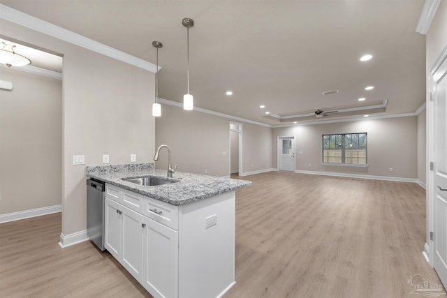 6607 Rocky Shores Rd, Milton, FL 32583 - kitchen with light wood-type flooring, stainless steel dishwasher, white cabinets, ceiling fan, and light stone counters