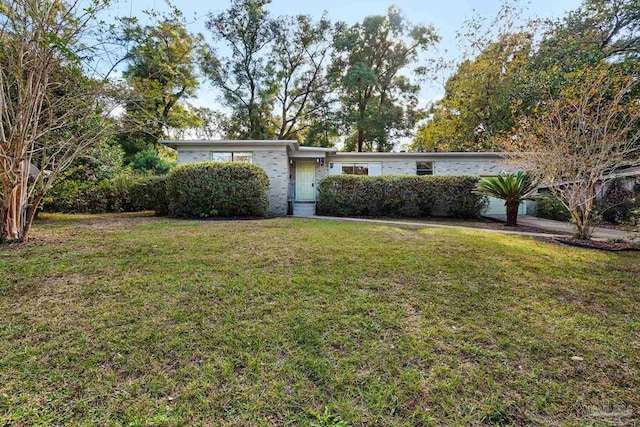 exterior space featuring a front lawn