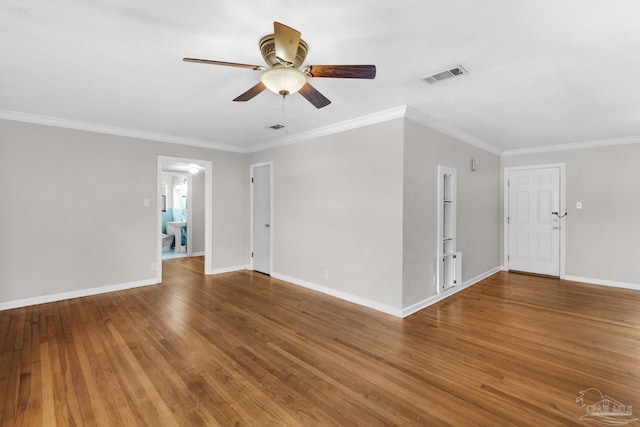 unfurnished room featuring hardwood / wood-style flooring, ceiling fan, and ornamental molding