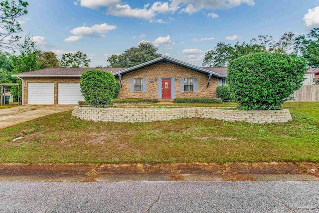 ranch-style home with a front yard and a garage