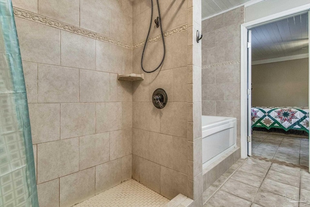 bathroom with tile patterned flooring, walk in shower, and crown molding