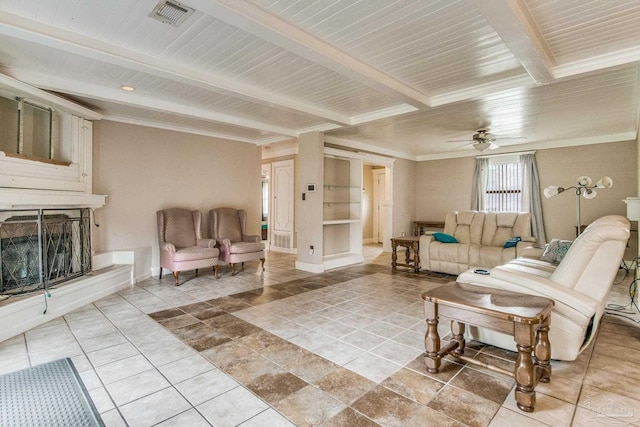 tiled living room with beamed ceiling and ceiling fan