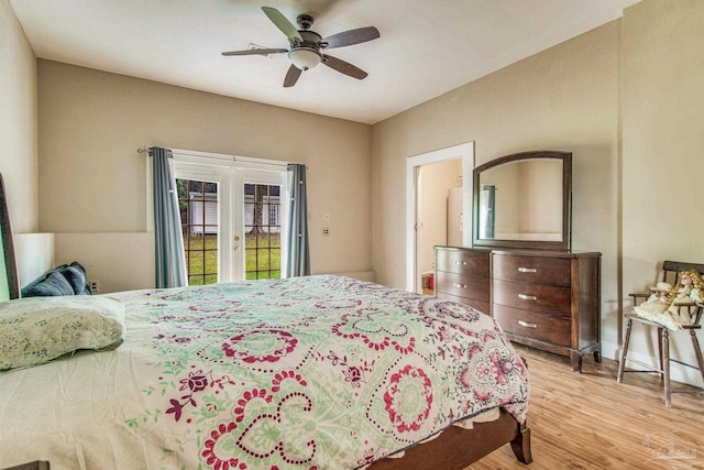 bedroom with access to exterior, light wood-type flooring, and ceiling fan