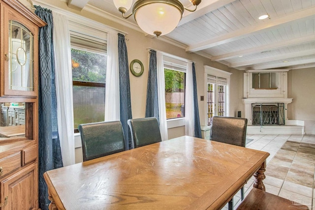 tiled dining area featuring a chandelier, crown molding, and beamed ceiling