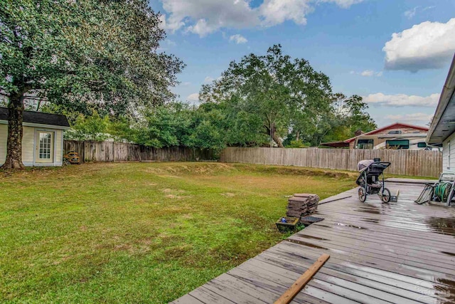 view of yard with a wooden deck