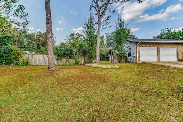 view of yard featuring a garage