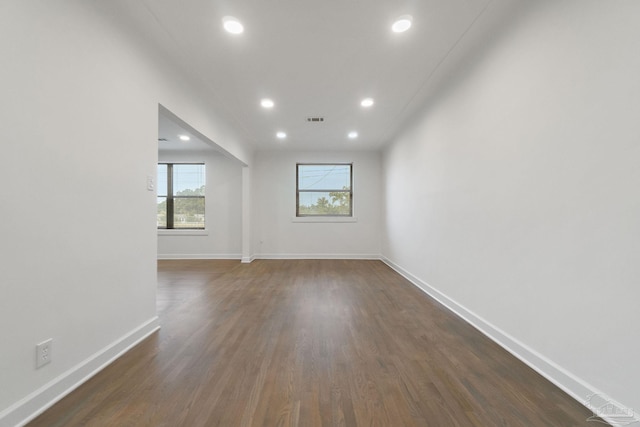 empty room featuring dark hardwood / wood-style floors