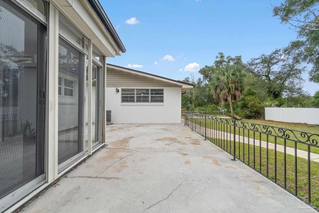 view of patio / terrace with fence