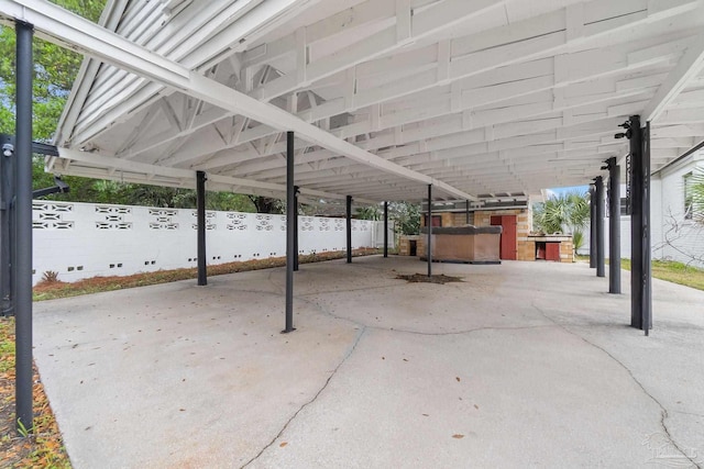 view of patio featuring a carport