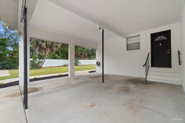 view of patio / terrace featuring a carport