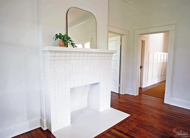 details featuring a fireplace and hardwood / wood-style floors