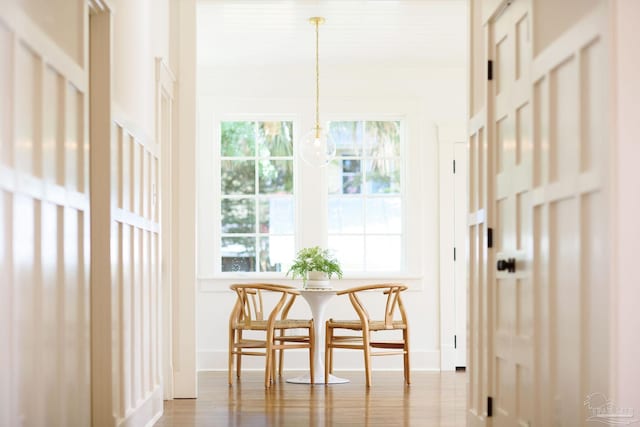 sunroom featuring breakfast area