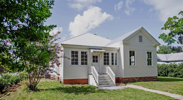 view of front of home with a front yard