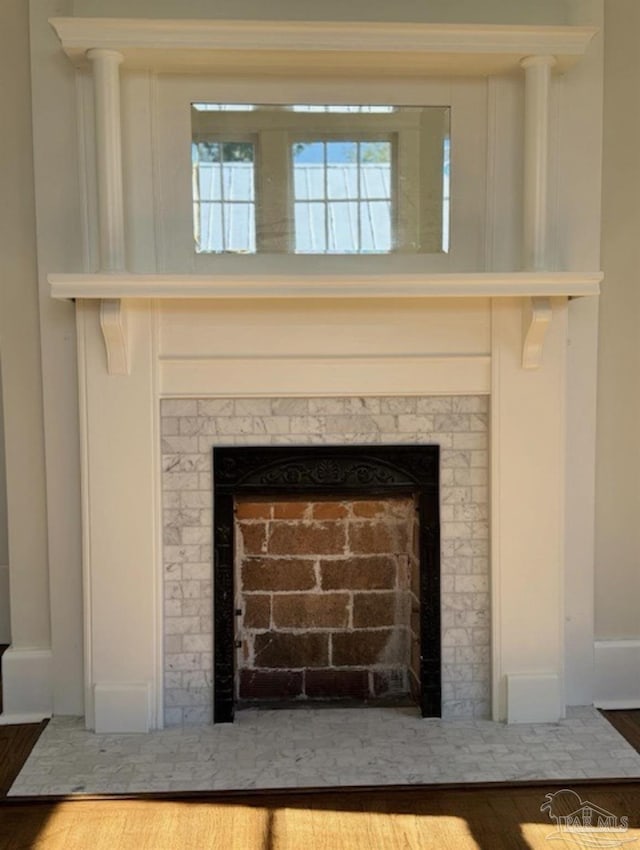 1524 E Strong St, Pensacola, FL 32501 - detailed view of a fireplace with flush hearth and wood finished floors