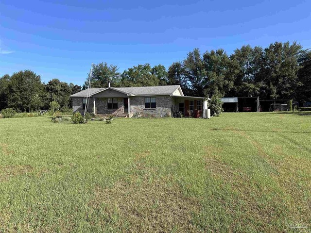 exterior space with a front yard