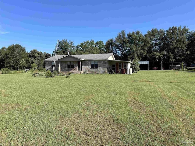 view of front of home with stone siding and a front lawn