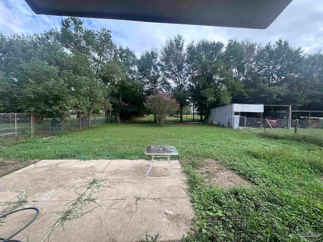 view of yard with a patio area and fence