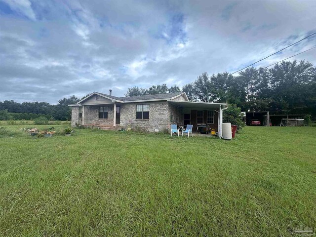 view of pool featuring fence and a yard