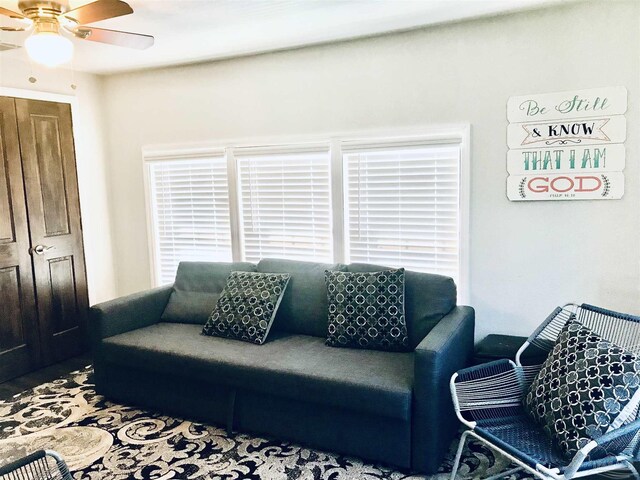 living room with ceiling fan